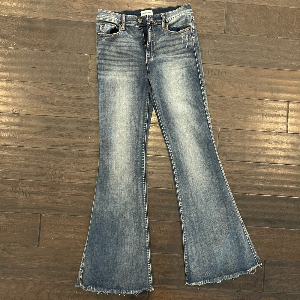 Sneak Peek flare Jean. Never worn without tags. Size 27